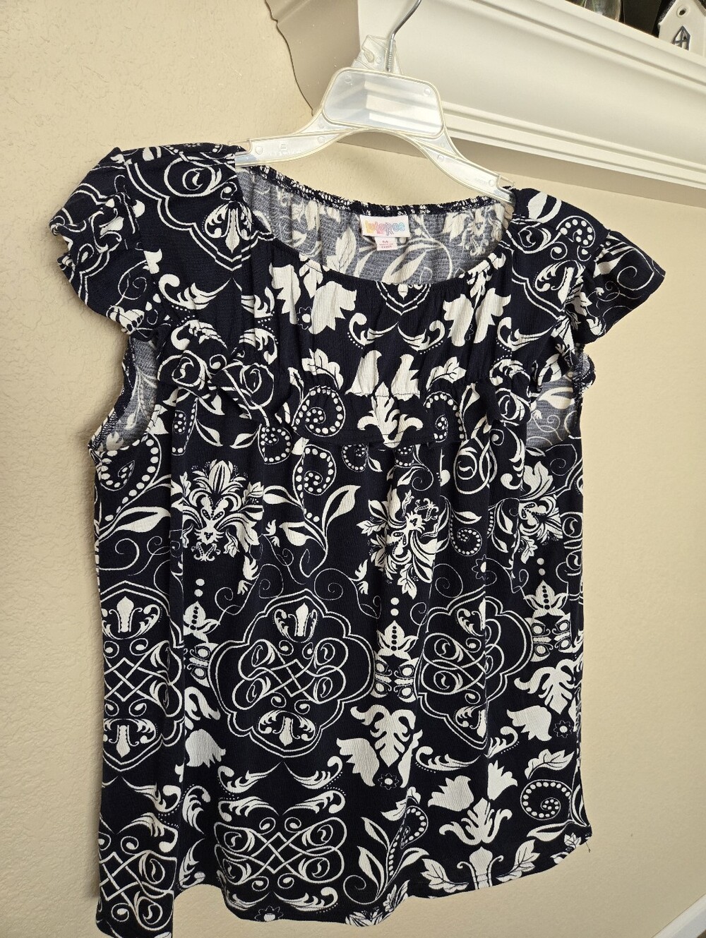 LulaRoe "Stasha" Dark Navy & White Patterned Flutter Sleeve Top, Size M